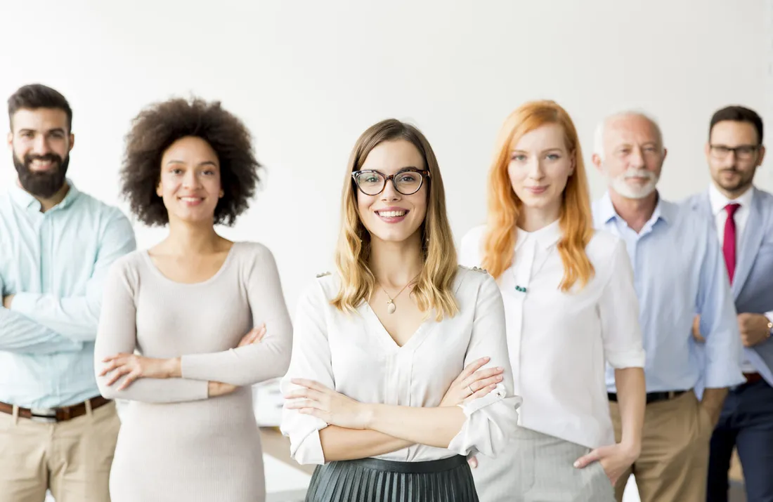 A team of smiling professionals